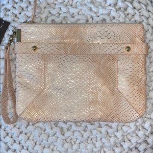 The limited Clutch and Wristlet.